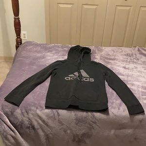 I’m selling a small black adidas kids sweatshirt.